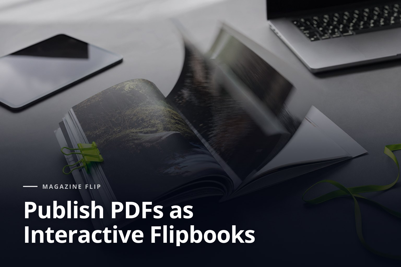Open magazine on a table for publishing PDFs as interactive flipbooks, with laptop and tablet